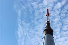 an antenna on top of a tall tower