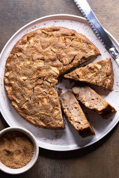 a pie on a plate with two slices cut out