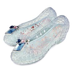 The fairytale begins when stepping into these stardusted Cinderella slippers. Translucent and flexible, they feature light-up heels, and elegant, faceted gem fixtures on each toe. Dare to dance until midnight—or at least until bedtime! Authentic Disney Princess costume shoes inspired by Walt Disney's Cinderella. Genuine, Original, Authentic Disney Store Product. Light Up Costumes, New Cinderella, Disney Princess Toys, Disney Princess Costumes, Cinderella Slipper, Kids Halloween Costumes, Shoes For, Cinderella Costume, Princess Toys