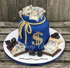 a birthday cake made to look like a money bag