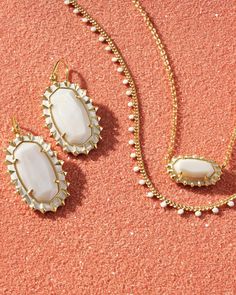 There’s truly no better way to top off your look than with a pop of color. Complete with dainty enamel embellishments, the Kendra Scott Kelsey Gold Strand Necklace in White Enamel is the vibrant yet minimal accessory your layers will love. Metal 14k Yellow Gold Over BrassMaterial White EnamelClosure Lobster Clasp W/ Single Adjustable Slider BeadSize 19" Chain Please note: Due to the one-of-a-kind nature of the medium, exact colors and patterns may vary slightly from the image shown. Kendra Scott products are thoughtfully crafted in their Austin, Texas studio, pushing the boundaries of design and innovation while staying true to their principles: color, shape, material, and value.The Twisted Chandelier Boutique is an authorized retailer of Kendra Scott. Short Pendant Necklace, Color Burst, Minimal Accessories, Initial Jewelry, Floral Jewellery, Kendra Scott Jewelry, Earring Sale, Brass Material, Innovative Design