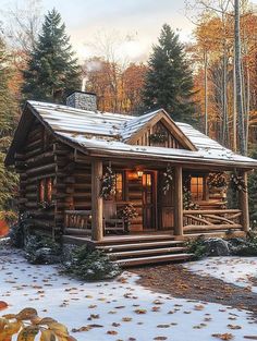 a log cabin in the woods with snow on the ground and autumn foliage around it