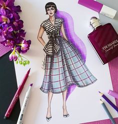 a drawing of a woman in a dress next to purple flowers and perfume bottles on a table