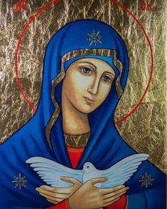 an icon of the virgin mary holding a dove