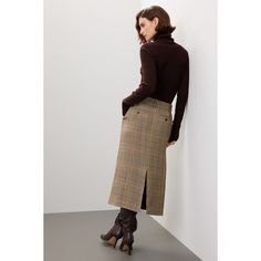 Brown plaid twill (100% Viscose). Pencil. Front zipper fly with button closure. 30" from waist to hemline. Imported. Fall Workwear Skirt, Plaid Midi Skirt For Fall, Fall Office Lined Skirt Bottoms, Elegant Plaid Skirt For Work, Plaid Lined Skirt For Workwear, Chic Plaid Skirt For Workwear, Elegant Plaid Skirt, Plaid Relaxed Work Skirt, Classic Plaid Skirt For Fall