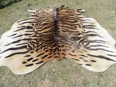 a zebra print rug is laying on the ground