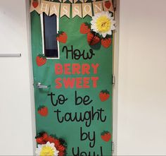 a door decorated with strawberries and flowers for the new berry sweet to be taught by you