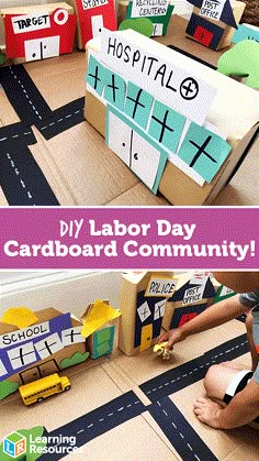 cardboard boxes with the words labor day on them and some children playing in front of them