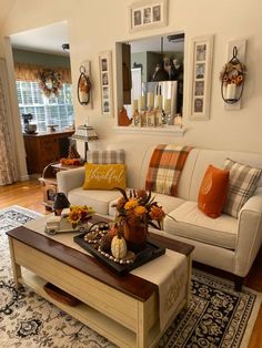 a living room filled with furniture and decor