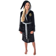 If youre looking for licensed Harry Potter merchandise, youve come to the right place! Intimo specializes in creating officially licensed childrens apparel that is comfortable, practical, and fun. This Harry Potter plush bathrobe is made of soft, polyester that will keep you comfortable and warm whether you are getting out of the shower or using it as a costume. It comes in a range of sizes to fit you or your Harry Potter fan perfectly and is designed for women's juniors. You can choose from 4 different designs: Gryffindor, Ravenclaw, Hufflepuff, or Slytherin. Each robe features the house crest embroidered over the left chest, a long hood, a color to match the chosen Hogwarts house, a belt, and pockets. Such a stylish robe is sure to go a long way as a gift. Made from high-quality polyeste Harry Potter Plush, Hufflepuff Slytherin, Gryffindor Ravenclaw, Ravenclaw Hufflepuff, Plush Robe, Harry Potter Style, Harry Potter Merchandise, Harry Potter Outfits, One Piece Clothing