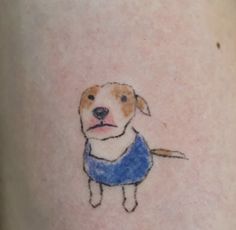 a dog with a blue bandana on its neck is shown in this tattoo design