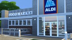 the front of a grocery store with an aldi sign on it's side