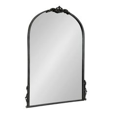 Bring the timeless beauty of French provincial design into your home with the lovely Myrcelle wall mirror. This beautiful accent piece features a sophisticated arched shape with ornate garland details along the edges and crown of the frame. Its antique black finish captures the vintage look it strives for, providing a warm and storied visual that draws the eye and captures the imagination. The Myrcelle mirror is a striking statement with its substantial size, measuring 24.5 inches wide by 1.5 inches deep by 32.5 inches tall. This large mirror is perfect for styling on your mantle, over an entryway console, or above your vanity as a bathroom mirror. Adding this lovely piece of wall decor not only showcases your unique style but enhances the vibrancy and depth of your space with its large su Mirror Black Frame, Black Arch Mirror, French Provincial Design, Mantel Mirror, Black Arch, Mirror Antique, Big Mirror, Mirror Metal, Arched Mirror