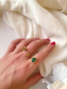 This minimalist adjustable ring is made of stainless steel, lead and nickel free, plated with 14k gold and set with imitation malachite stone. (mix of natural stone, dyes and resin) A dreamy adjustable ring you will not regret adding to your jewelry box! Find Rose ring here: https://www.etsy.com/uk/listing/1020621839/rose-adjustable-gold-ring-nature?click_key=073519728126ec8171d1ac09573386f418e7828c%3A1020621839&click_sum=9ecbe9cc&ga_search_query=ring&ref=shop_items_search_3&frs=1&sts=1 Find Mal Adjustable Stainless Steel Stackable Rings, Adjustable Emerald Open Ring, Adjustable Minimalist Emerald Ring For Everyday, Adjustable Open Emerald Ring, Oval Dainty Midi Rings For Gift, Dainty Oval Midi Rings For Gift, Adjustable Gold Emerald Ring, Adjustable Minimalist Emerald Open Ring, Trendy Oval Rings For Gifts