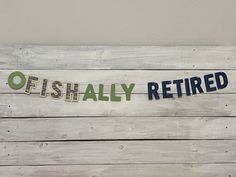 there is a sign that says offishly retired on it's wooden planks