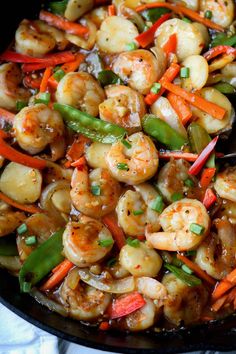 shrimp and vegetable stir fry in a skillet