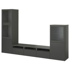 an entertainment center with shelves and cupboards on the side, in front of a white background