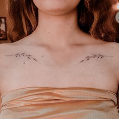 a woman with a tattoo on her chest