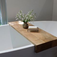 Ideal for freestanding baths. This design hugs the bathtub and creates a modern look. Size: 85x25cm Handmade from sustainably sourced mango wood. Important information: Please note that the colour of Mango Wood can vary. We try our hardest to control the colouring of each piece of timber, and aim to produce consistent-looking products.  Natural variation of colour is unavoidable with Mango Wood. This needs to be taken into consideration when placing your order. If you would like to preview alrea Bathtub Shelf, Tub Tray, Bath Board, Old Barn Doors, Rustic Bath, Rustic Stools, Bath Shelf, Bathtub Tray, Wood Bath