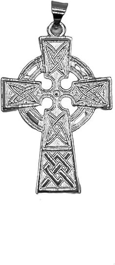 a cross with an intricate design on the front and back side, in black and white