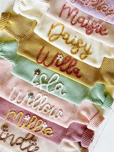 six different colored ribbons with the names of each ribbon on them, all in different colors