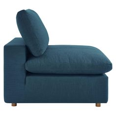 a blue chaise lounge chair with two pillows on it's back and legs