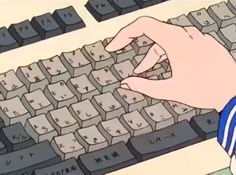 a person typing on a computer keyboard with their hand in the key board and fingers pointing at it