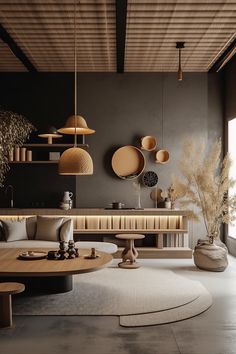 a living room filled with lots of furniture next to a wall mounted shelf and window