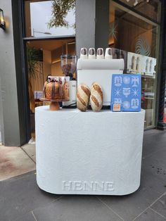 there is a counter with breads on it