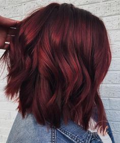 Mulled Wine Hair Is The Latest Winter Hair Color Trend & It's Completely Wearable Pinot Noir Red Hair, All Over Brown Hair Color Fall, Dark Cherry Red Hair Medium Length, Chin Length Bob Red Hair, Burgundy Hair With Black Money Piece, Multi Tone Red Hair, Burgundy Hair Medium Length, Cool Reds Haircolor, Cool Dark Red Hair