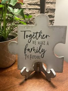 a sign that says together we make a family, the fidgetrs on it