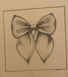 a pencil drawing of a bow on a piece of paper with a frame around it