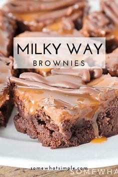 there is a white plate with brownies on it and the words milky way above it