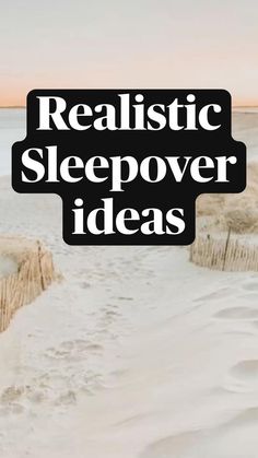 the words realistic sleepover ideas are overlaid by sand dunes and footprints in the sand