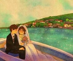 a couple sitting in a boat on the water