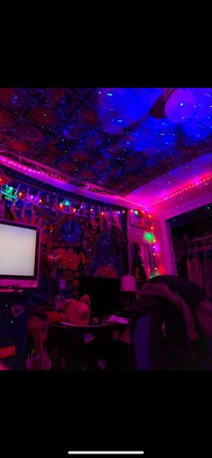 the room is lit up with colorful lights