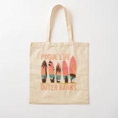 a tote bag with an image of two surfboards and palm trees on it