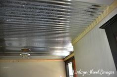 the inside of a house with tin foil covering the ceiling