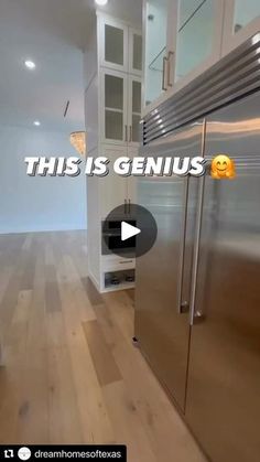 a stainless steel refrigerator in a kitchen with the words, this is genius on it