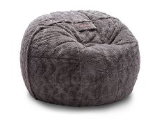 a grey bean bag chair sitting on top of a white floor