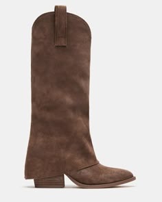 Crafted from luxurious suede, the SORVINO boot embodies elegance. With a Western flare and pointed toe, this boot is a bold statement piece that exudes sophistication. The foldover construction adds a slouchy style to these knee-high boots. 2.5 inch heel height Size 6 measurements: 13 inch shaft circumference, 11 inch shaft height Size 8 measurements: 14 inch shaft circumference, 11.5 inch shaft height Size 10 measurements: 15 inch shaft circumference, 12 inch shaft height Suede upper material T Suede Fall 2024, Knee High Suede Boots Outfit, Foldover Boots, Suede Boots Outfit, Womens Fall Boots, Knee High Western Boots, Boots For Fall, Skandinavian Fashion, Slouchy Style