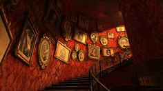 the stairs are covered with clocks and pictures