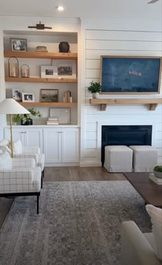 the living room is clean and ready to be used as a den or family room