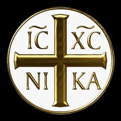 a gold cross with the words icxc and nika written in large letters