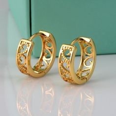 Beautiful Crafted Women's Hollow Swirl Carved Hoop Huggie Earrings 24k Yellow Gold Filled. Top Quality, Brand New And Never Been Worn. Lead And Nickel Free. Perfect Jewelry For Any Day, Special Occasion Gift Anniversary Wedding Banquet Dating Birthday Promise Prom Dance Holiday Party Christmas Stocking For Yourself Mom Women Sister Daughter Granddaughter Teen Or Friend. Free $18 Gift Of Your Choice In My Listings W/Purchase Of Two Or More Items. Bundle To Save On Shipping. Please Send Offers And Small Earrings Gold, Buy Earrings Online, Vogue Jewelry, Hollow Earrings, Gold Earrings Models, Prom Dance, Gold Necklace Indian Bridal Jewelry, Beaded Necklace Designs, Gold Bride Jewelry