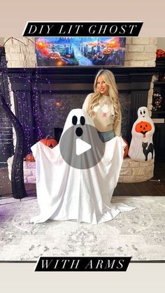 a woman sitting on top of a ghost in front of a fireplace