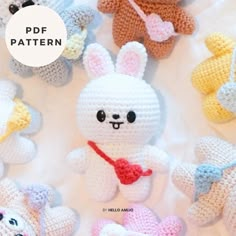 several crocheted stuffed animals sitting on top of a white sheet with text overlay that says free pattern