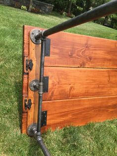 an old wooden box with pipes attached to it