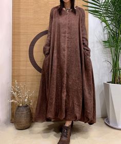 【Fabric】 linen Lining  cotton 【Color】 Brown, peacock blue, purple 【Size】  Shoulder width is not limited Shoulder + Sleeve Length 68cm / 26" Bust 130cm / 50" Length 123cm / 47" Washing & Care instructions: -Hand wash or gently machine washable do not tumble dry -Gentle wash cycle (40oC) -If you feel like ironing (although should not be necessary) , do it with steam or while the dress is still slightly wet -Do not bleach If you like this dress, perhaps you will also like other dresses from our col Solid Color Linen Maxi Dress, Solid Long Cotton Maxi Dress, Solid Color Long Cotton Maxi Dress, Bohemian Long Sleeve Dress In Natural Fiber, Fall Long Sleeve Linen Dress, Bohemian Ramie Maxi Dress, Casual Linen Maxi Dress For Fall, Casual Maxi Linen Dress For Fall, Bohemian Long Sleeve Solid Color Maxi Dress