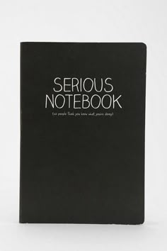 a black notebook with the words serious notebook written in white on it's cover